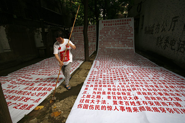 йC_ʼһֱһģooϷ档Dһwo@úϷ棬ŉTšֵ·ӑҪϷ档(Photo by China Photos/Getty Images)