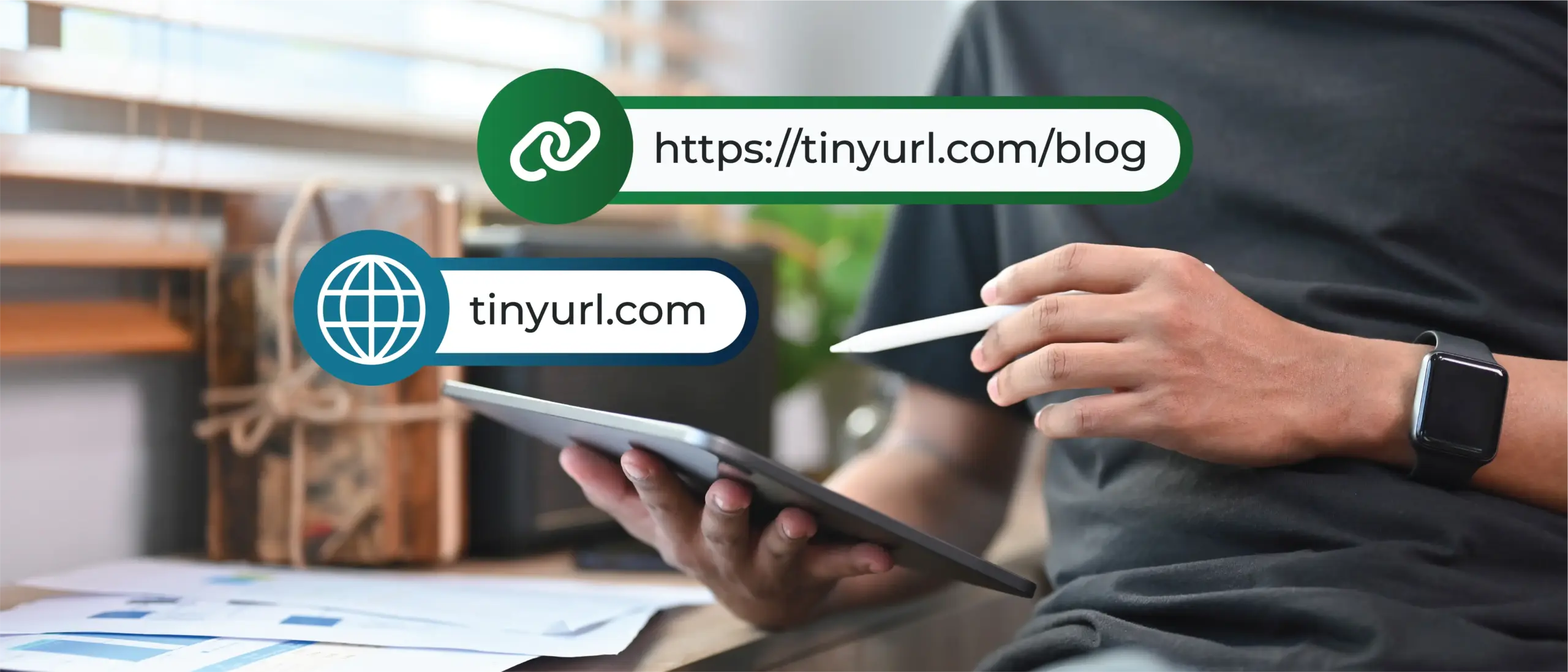 Image of a person holding a stylus and computer tablet. This is overlaid with the URL tinyurl.com/blog, and the domain tinyurl.com