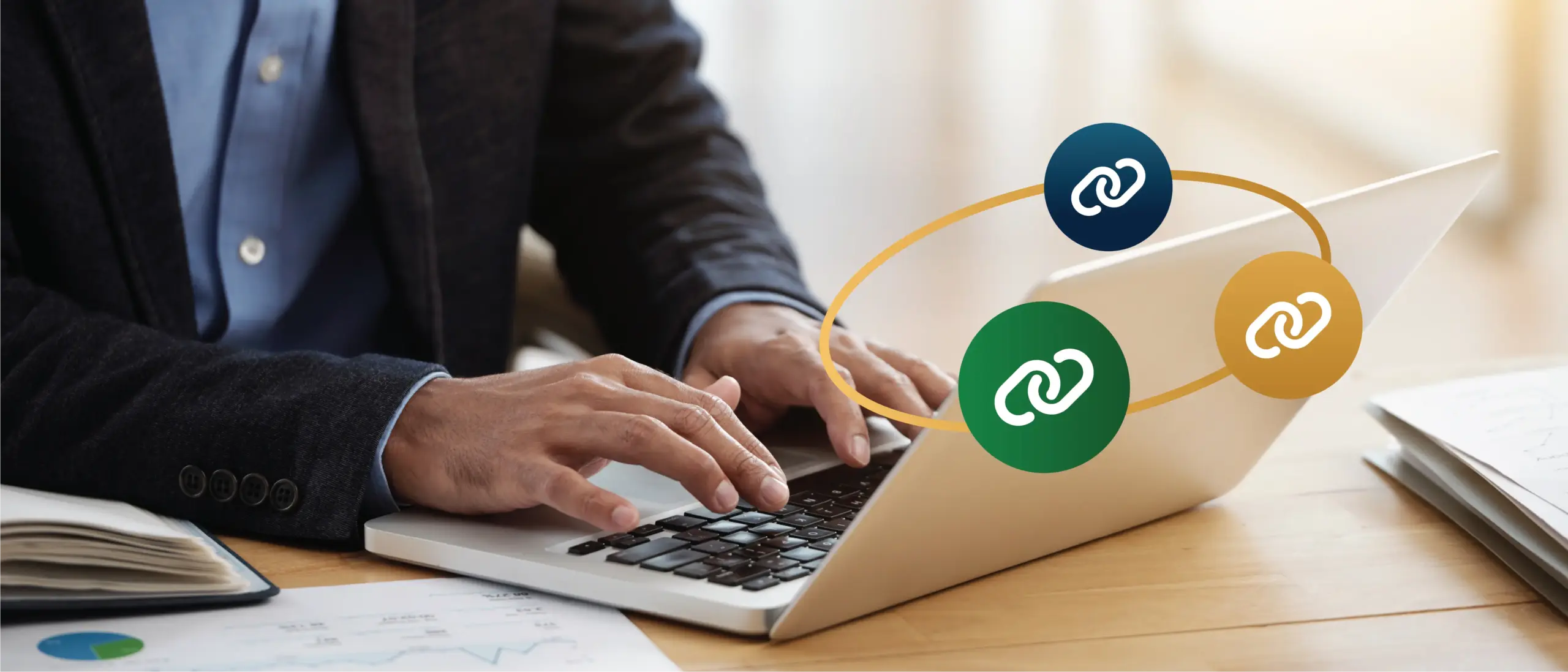 Image of a person typing on a laptop. Overlaid are round icons with symbols of hyperlinks.