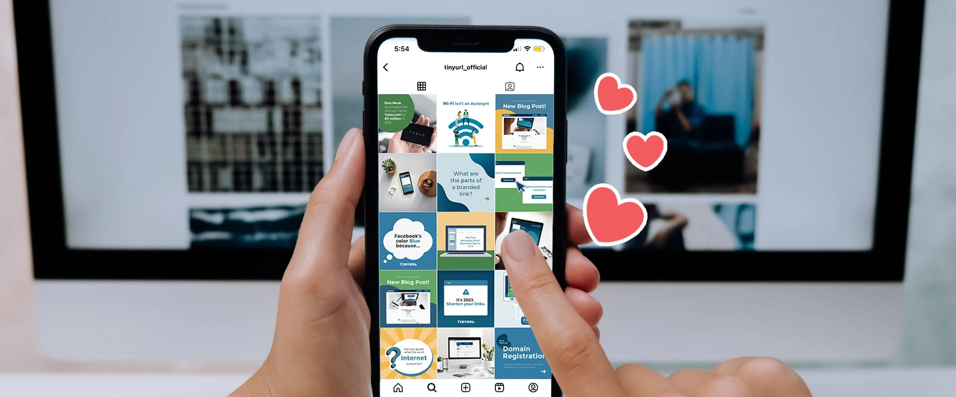Header image for article. View of person holding smartphone with TinyURL Instagram feed and illustrated hearts floating from it.