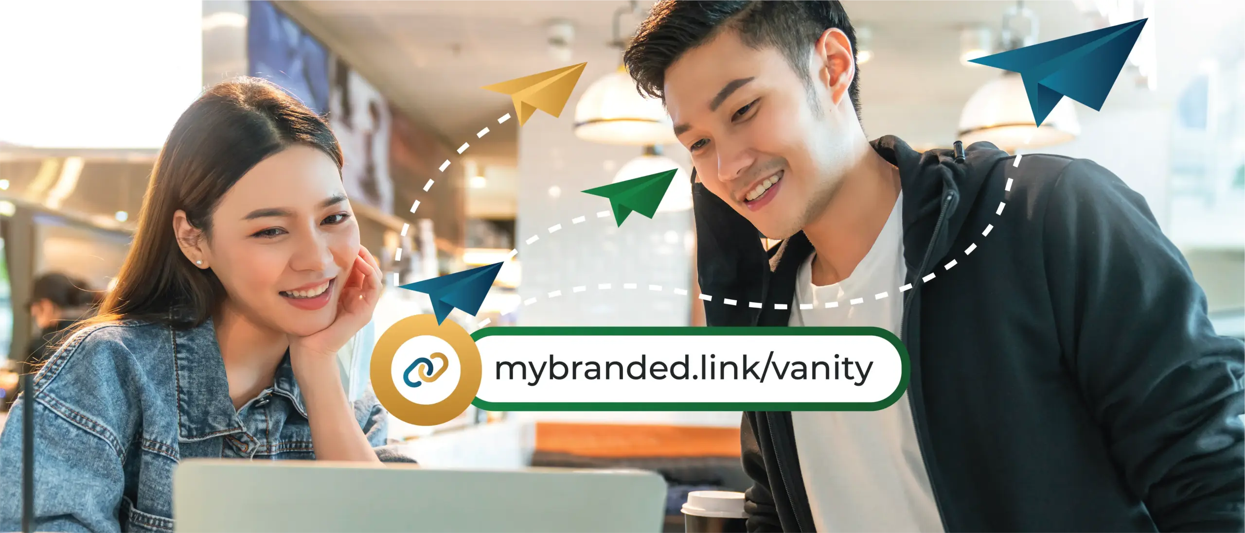 Two people looking at a laptop screen. Below, an overlaid caption that reads mybranded.link/vanity